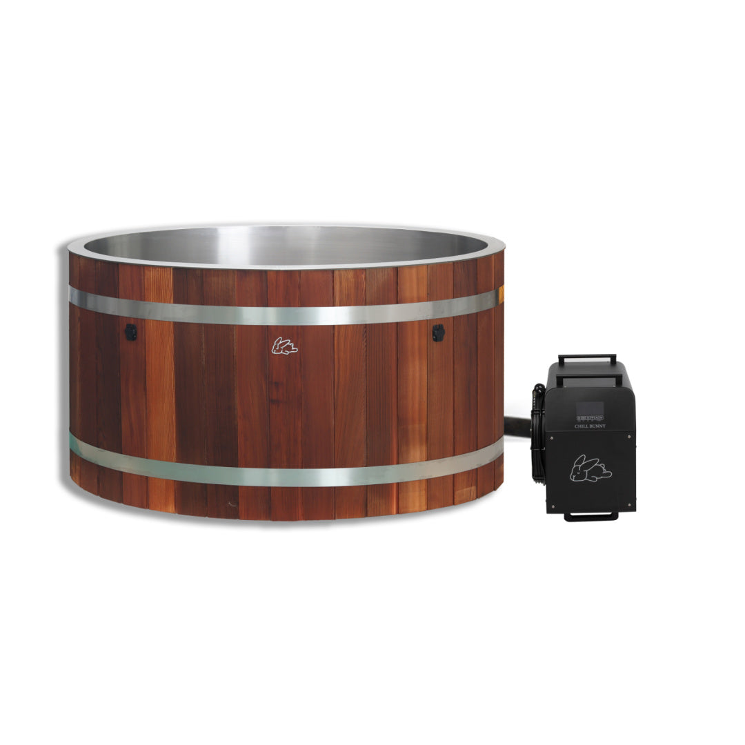 Wooden hot tub with metal rim and control panel on a white background