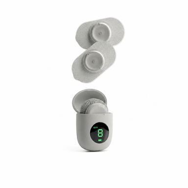 Close-up of NERV Pulse wireless EMS pods with premium compact design.