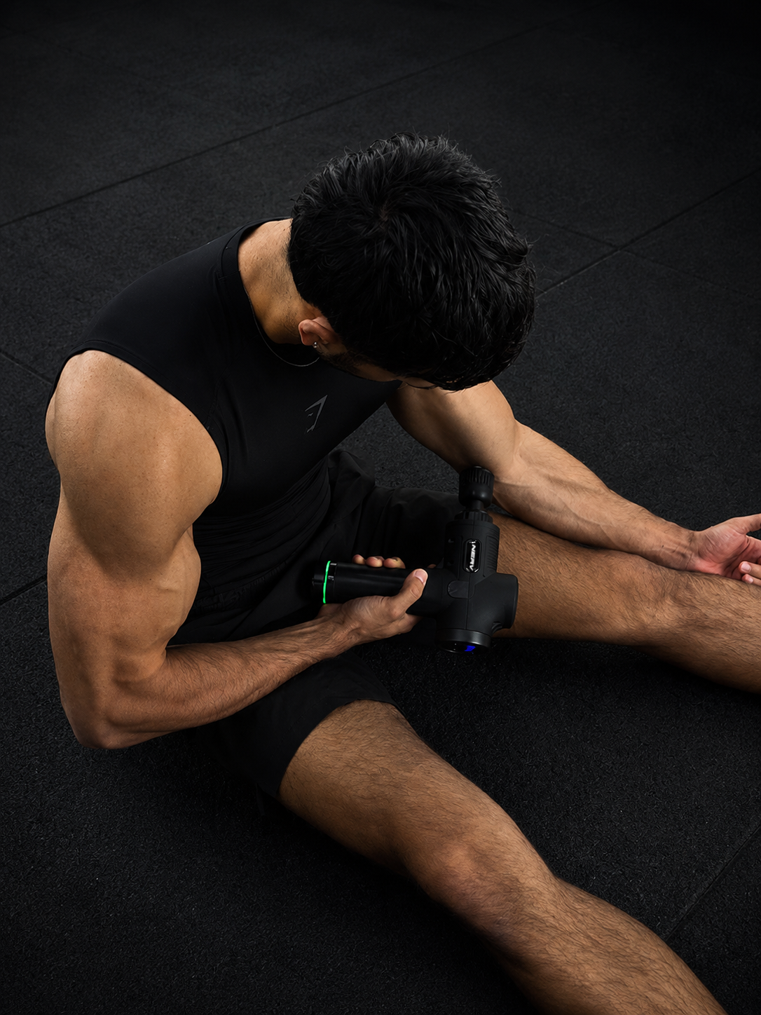 NERV Punch percussion massage gun helping reduce muscle soreness after training.