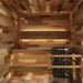 Interior view of a 4-person traditional sauna with seating and heater
