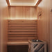 Interior view of a 2-person traditional sauna with seating and heater