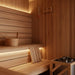 Interior view of a 4-person traditional sauna with seating and heater