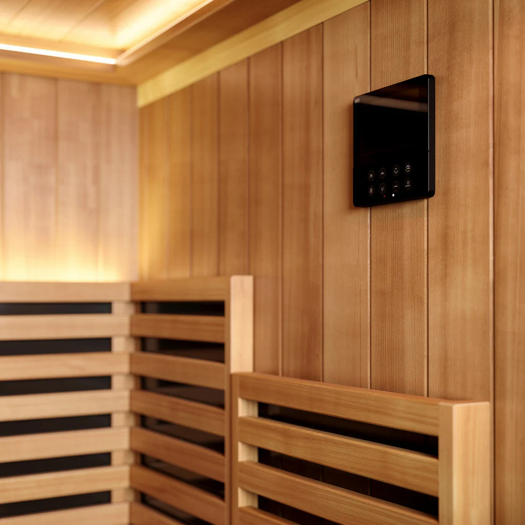Close-up of a 4-person indoor infrared sauna interior with touchscreen control panel