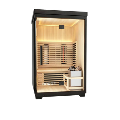 Angled view of a 2-person outdoor hybrid sauna with black coated exterior and glass door