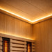 Close-up of a 4-person outdoor hybrid sauna interior with lights and infrared heaters