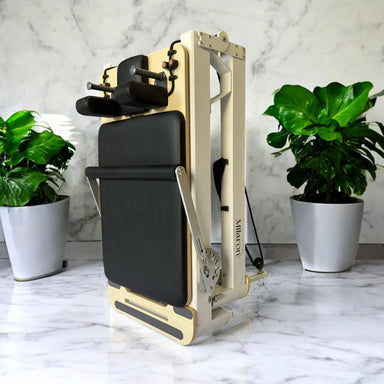 Pearl Foldable V2 pilates reformer creme color folded space-saving design