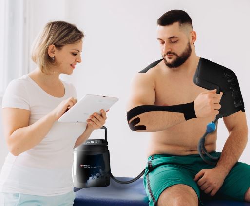 Patient using Polar Care Wave knee wrap for post-surgical cold and compression therapy