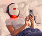 TheraFace Mask Glo LED face mask worn during treatment